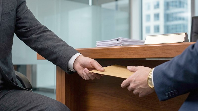 Three insurance executives charged in Belarus over $11,500 bribery scheme